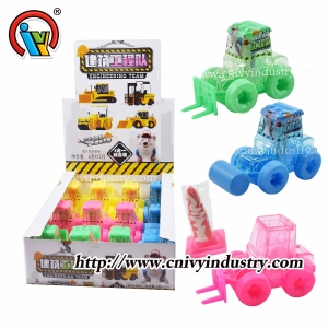 Іграшка вантажівка з фабрикою цукерок на льодяниках